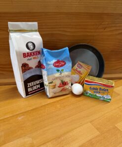 Eerlijke Boterkoek bakmix van Hilde met alle droge ingrediënten in verpakking van Bakken met Niels